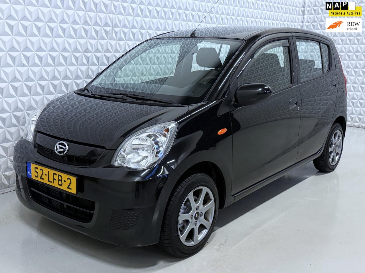 Daihatsu Cuore - 1.0 Comfort Airco AUTOMAAT / 77.000km (2010) - AutoWereld.nl