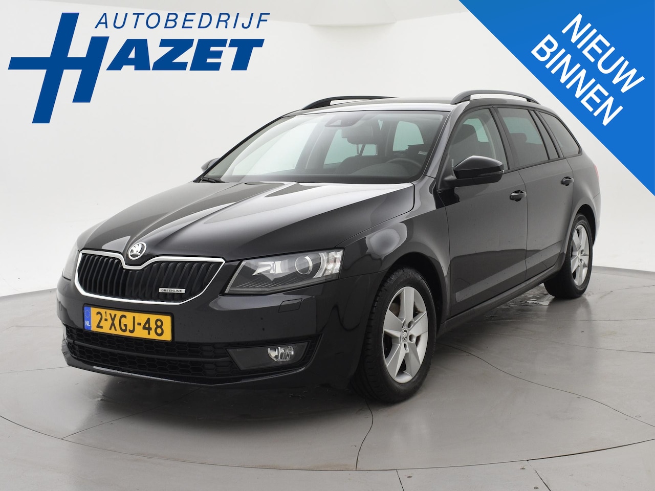 Skoda Octavia Combi - 1.6 TDI GREENLINE BUSINESS + LEDER | STOELVERW. | AFN. TREKHAAK | NAVIGATIE | DAB - AutoWereld.nl