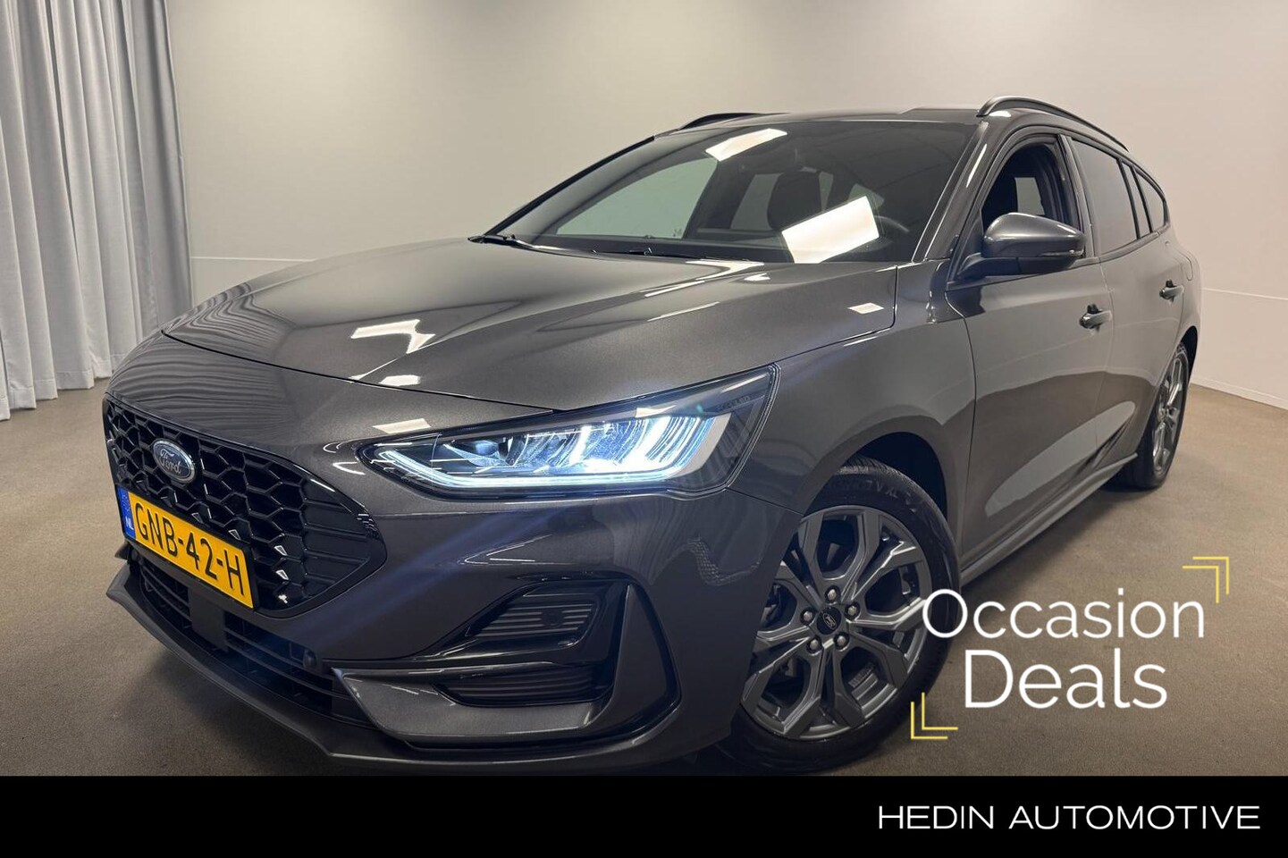 Ford Focus Wagon - 1.0 EcoBoost Hybrid ST Line | Stoel/Stuur/Voorruitverwarming | Navi | Car Play | Pr. Glass - AutoWereld.nl