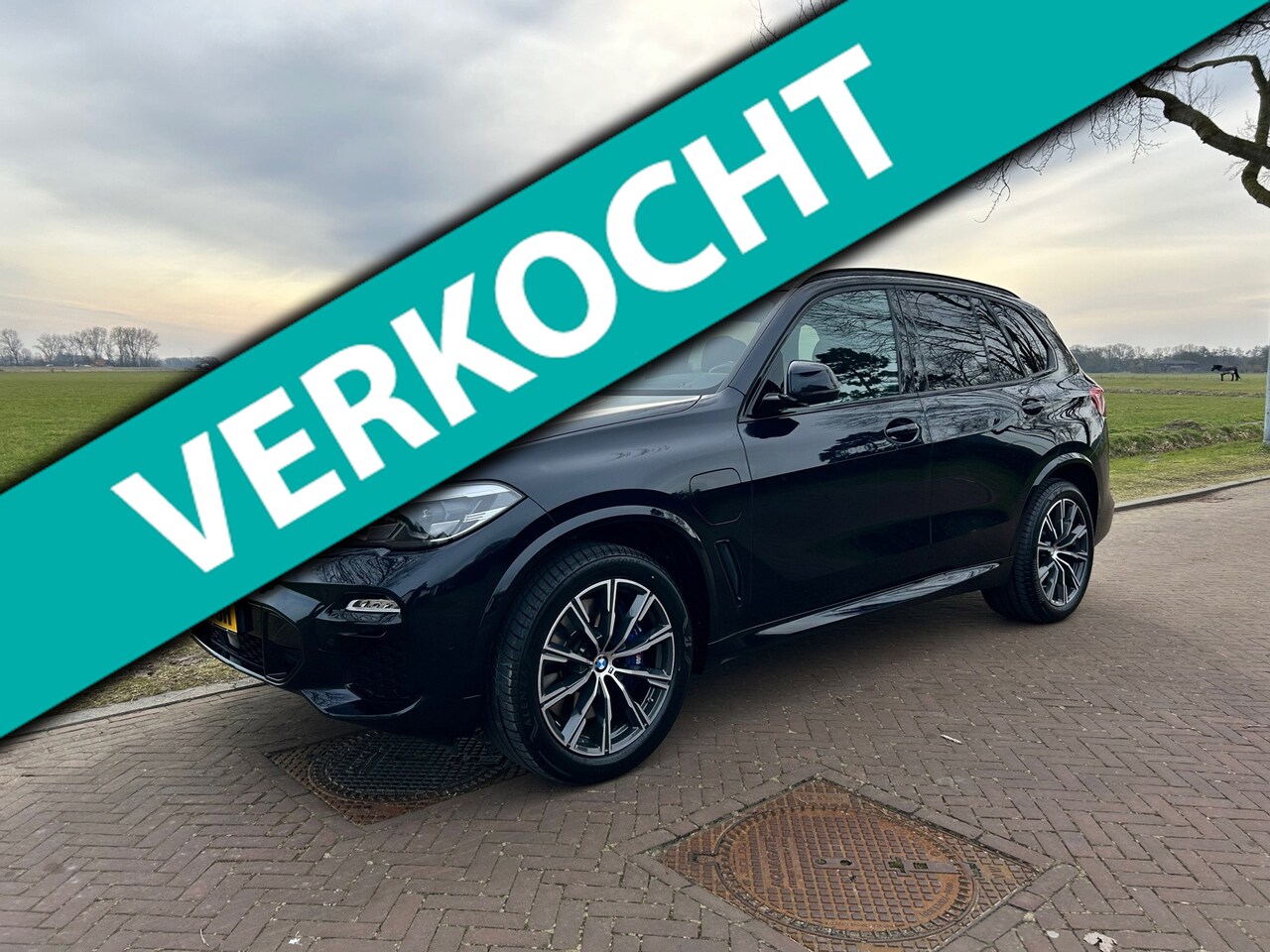 BMW X5 - XDrive45e High Executive M-Sportpakket Massagestoelen Carbon/black Pano/dak - AutoWereld.nl