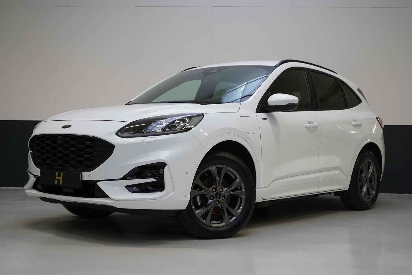 Ford Kuga - 2.5 PHEV ST-Line | Trekhaak | Lm velgen | Navigatie | Winterpack | Achteruitrijcamera - AutoWereld.nl