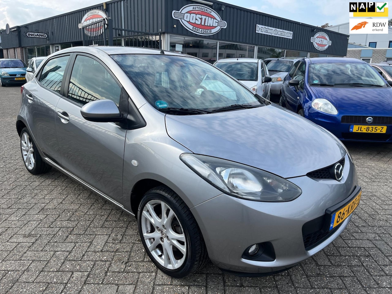 Mazda 2 - 1.3 TS Plus(st-bekr,airco,5drs,lmv,bj10,2999,-) - AutoWereld.nl