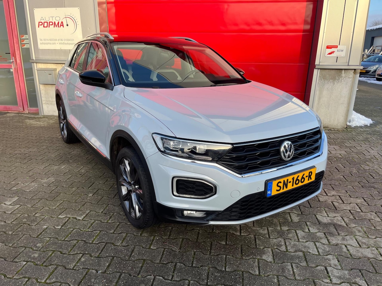 Volkswagen T-Roc - 1.5 TSI 150pk Sport / Stoelverw. / Adaptieve cruise / Trekhaak / Virtual cockpit / Navigat - AutoWereld.nl