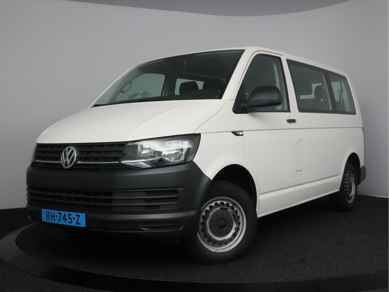 Volkswagen Transporter Kombi - 2.0 TDI L1H2 19750 excl. btw | 9 persoons | Airco | Taxi - AutoWereld.nl