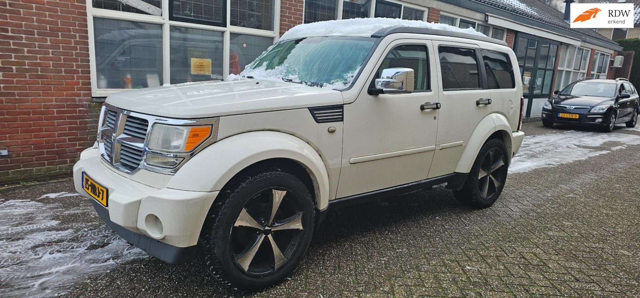 Dodge Nitro - 3.7 V6 SXT aut LPG 3500kg trekgew kop lek - AutoWereld.nl