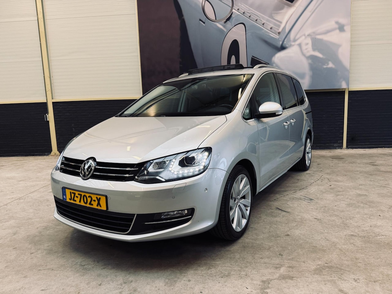 Volkswagen Sharan - 2.0 TSI Highline Automaat|Leder|Panodak|Dynaudio| - AutoWereld.nl