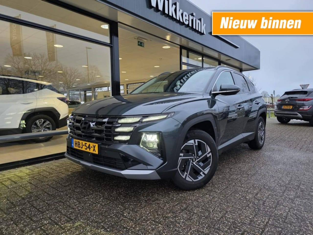 Hyundai Tucson - 1.6 T-GDI HEV COMF SMART ADAPTIEF/TREKHAAK - AutoWereld.nl