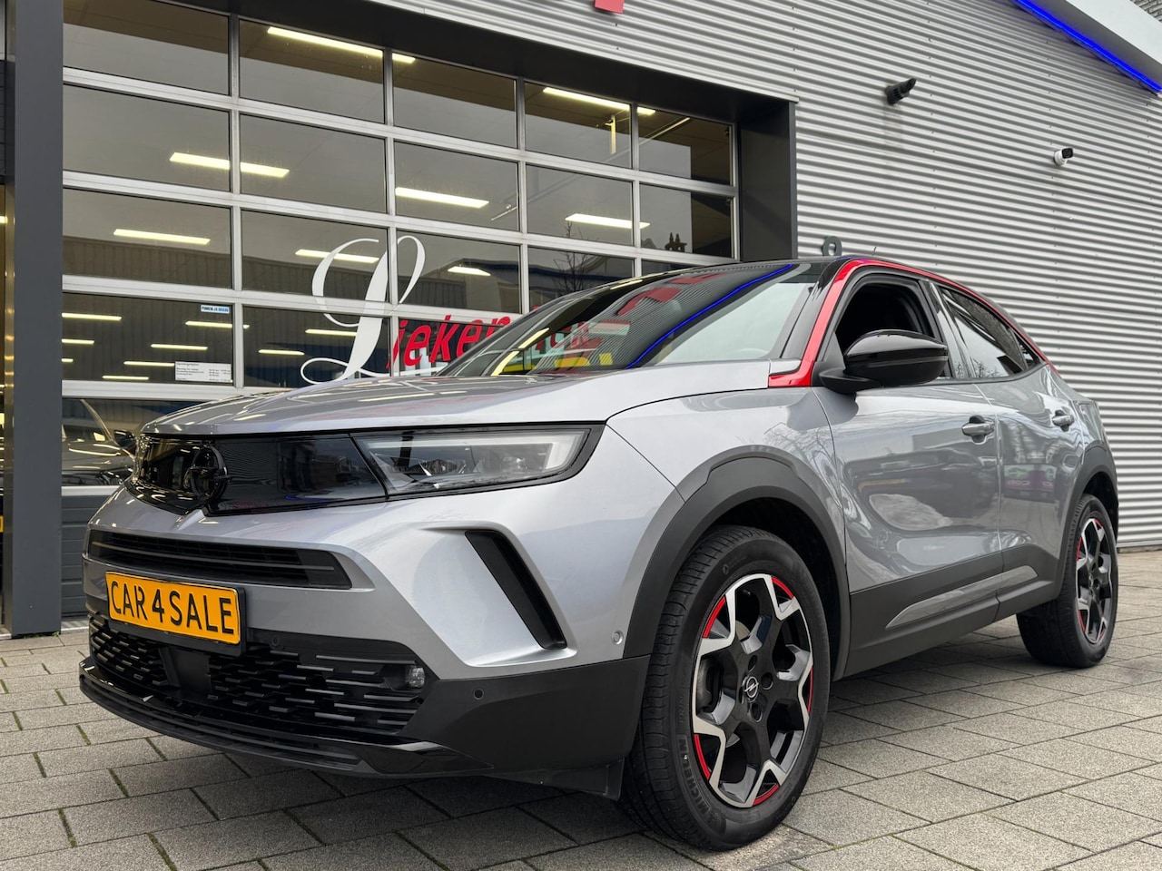 Opel Mokka - 1.2 Turbo GS Line Navigatie / Apple CarPlay I Airco I LED I PDC I Sport velgen I 39.000 KM - AutoWereld.nl