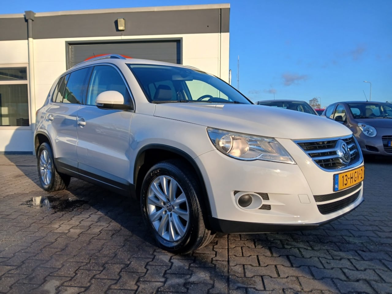 Volkswagen Tiguan - 2.0 TSI Sport/4-Motion/Automaat/200 PK - AutoWereld.nl