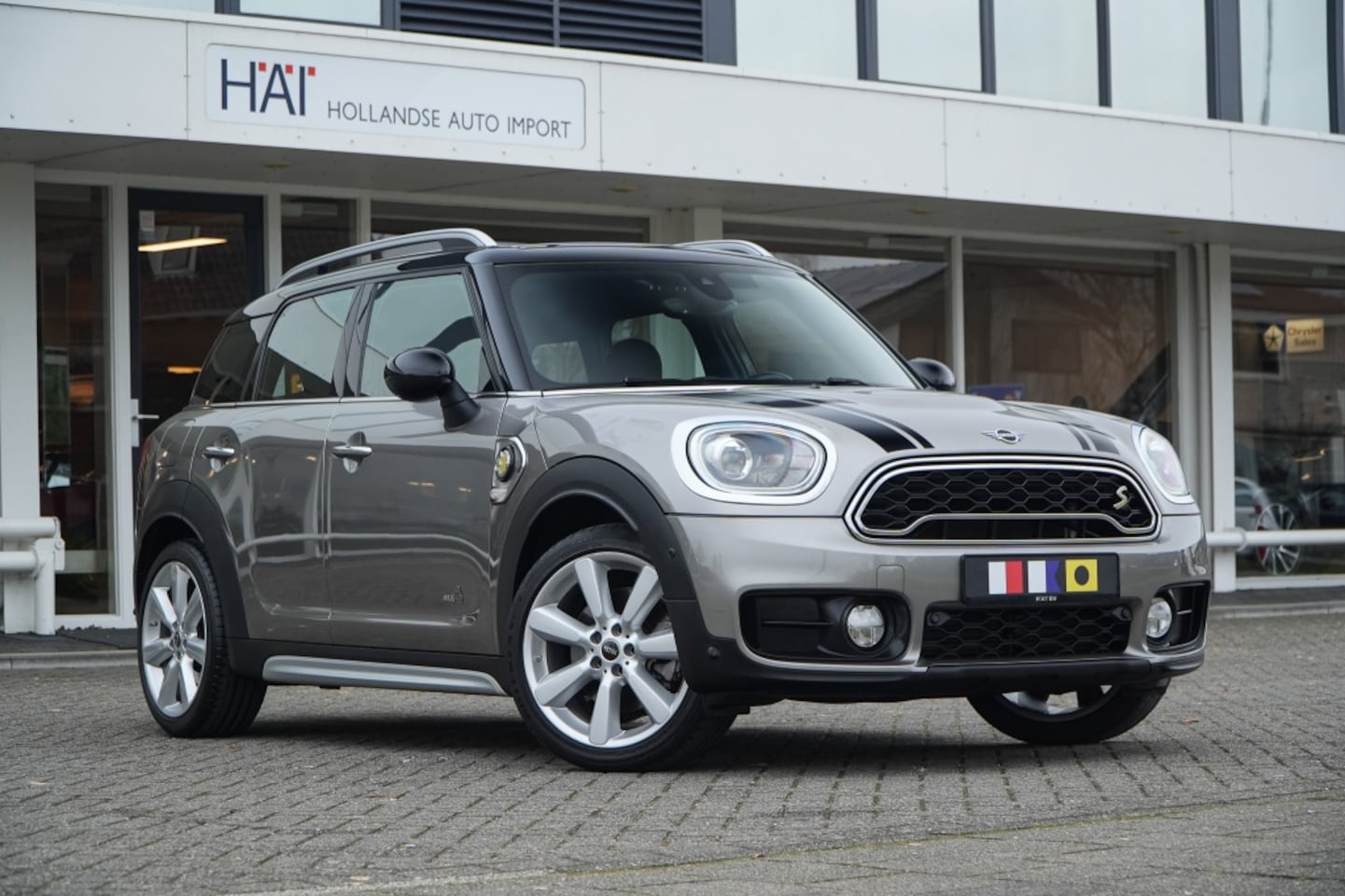 MINI Countryman - Mini 1.5 Cooper S E ALL4 I Navi I 19 inch I Clima I Elek. achterklep - AutoWereld.nl