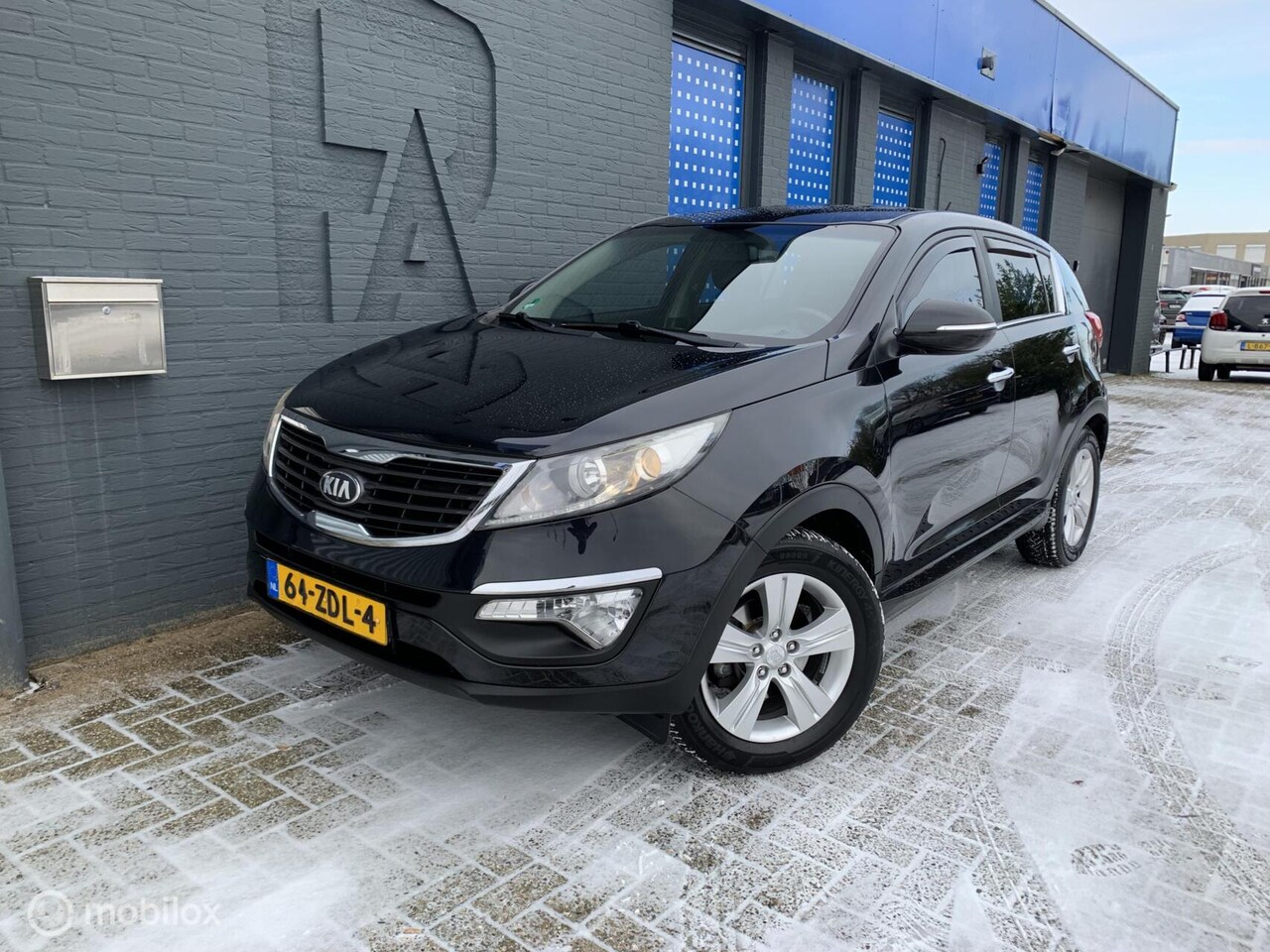 Kia Sportage - 1.6 GDI Comfort Pack Airco Cruise Start/Stop NL AUTO! - AutoWereld.nl