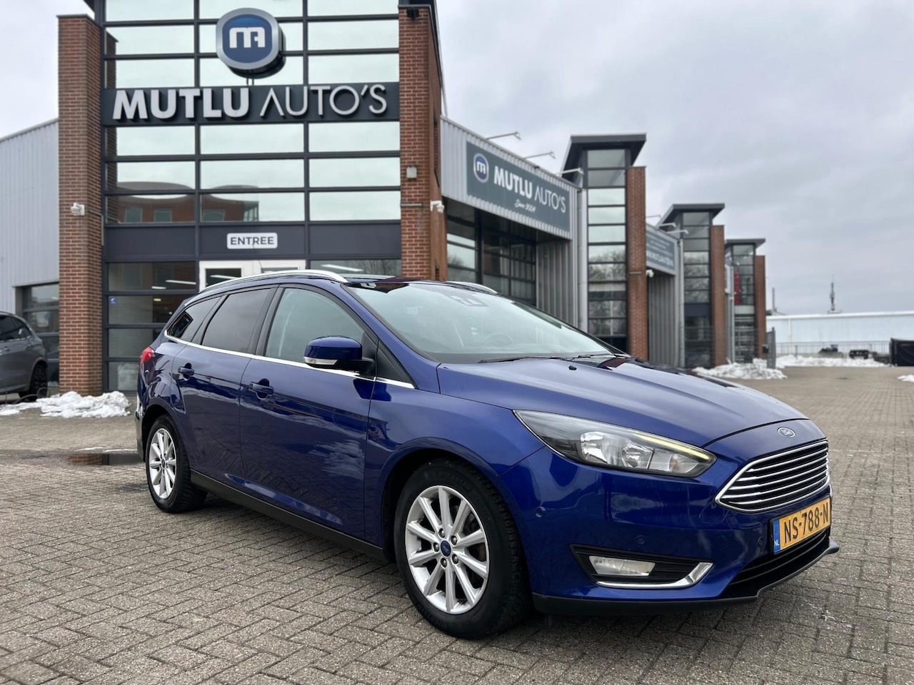 Ford Focus Wagon - 1.0 Titanium stoel/stuurverwmng PDC NAVI Cruise - AutoWereld.nl