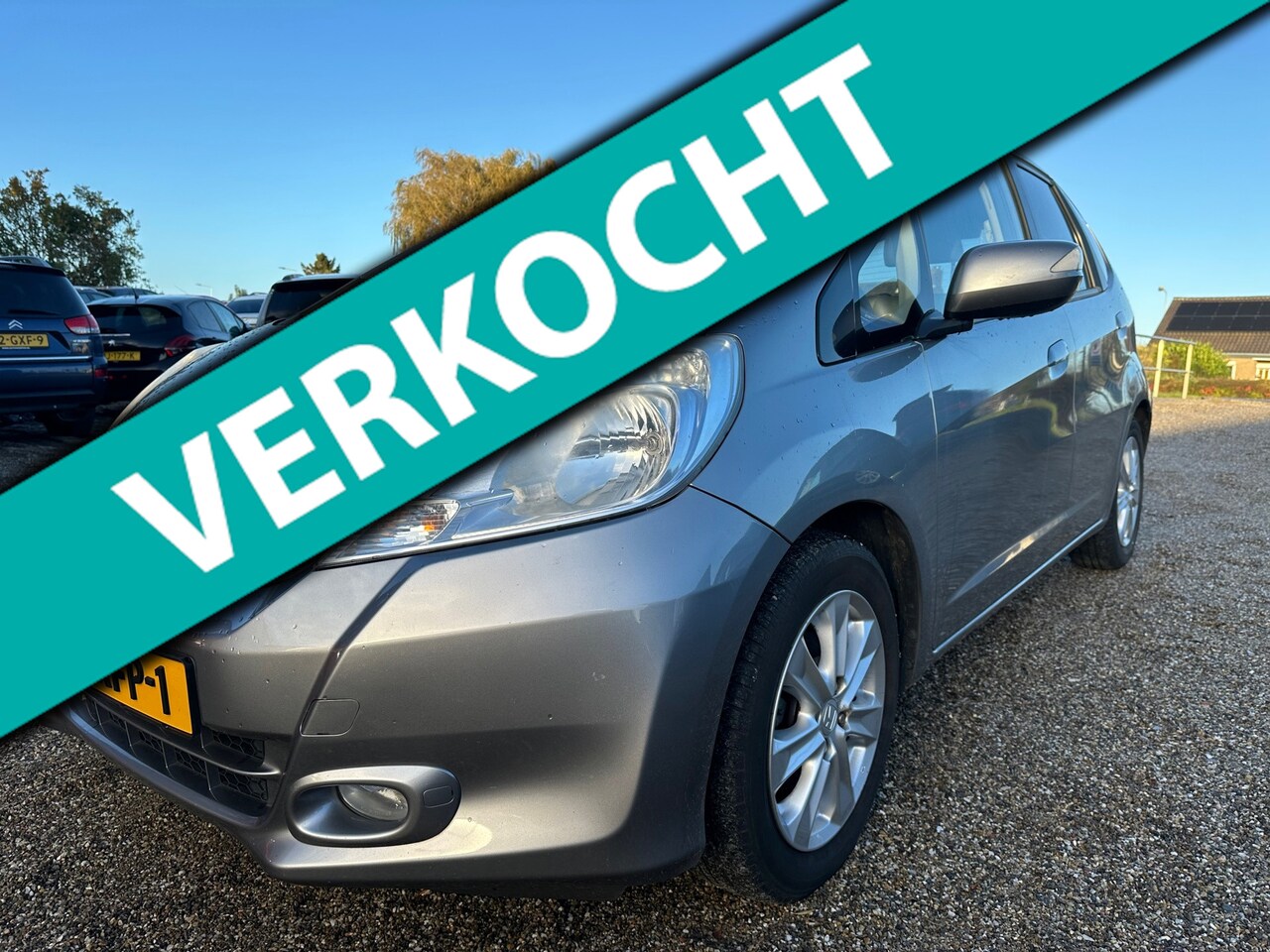 Honda Jazz - 1.4 Hybrid Exclusive Vol Optie AUTOMAAT Pano Leer StoelVerwarming - AutoWereld.nl