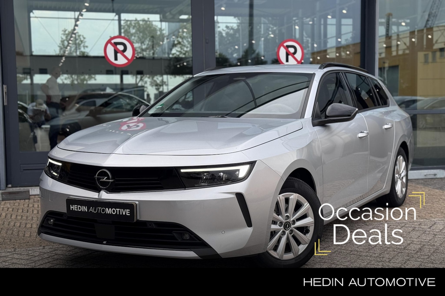 Opel Astra Sports Tourer - 1.2 Turbo Business Edition | Navigatie | Adaptive Cruise Control | Camera | Apple Carplay/ - AutoWereld.nl