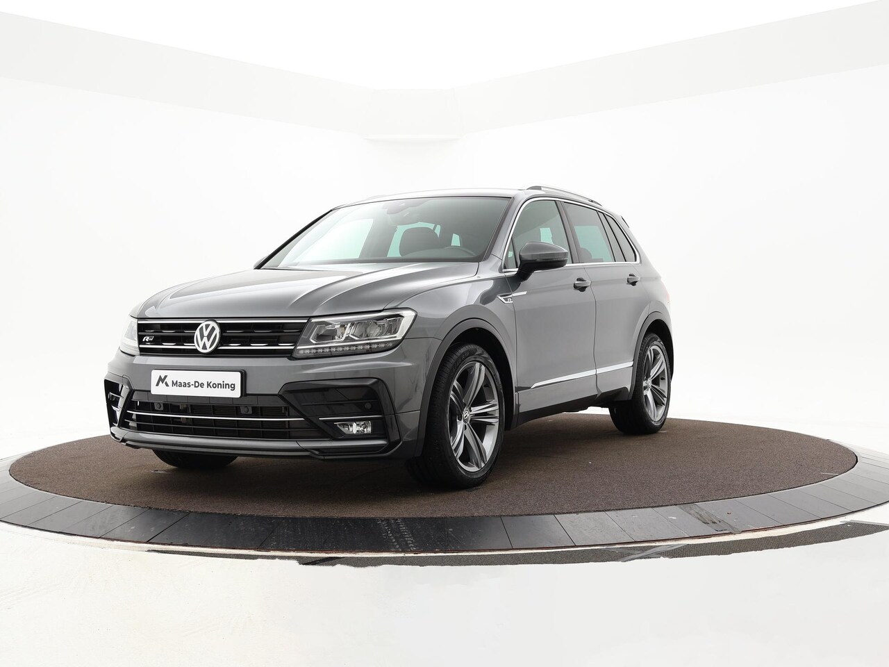 Volkswagen Tiguan - 1.5 TSI 130pk Comfortline Business R-line · Apple/Android Carplay · Alarm · Navigatie · P- - AutoWereld.nl