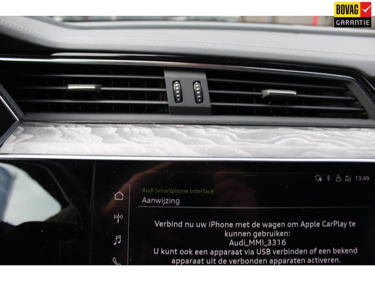 Audi e-tron Sportback - 55 quattro S edition 95 kWh ORANGE MET - AutoWereld.nl