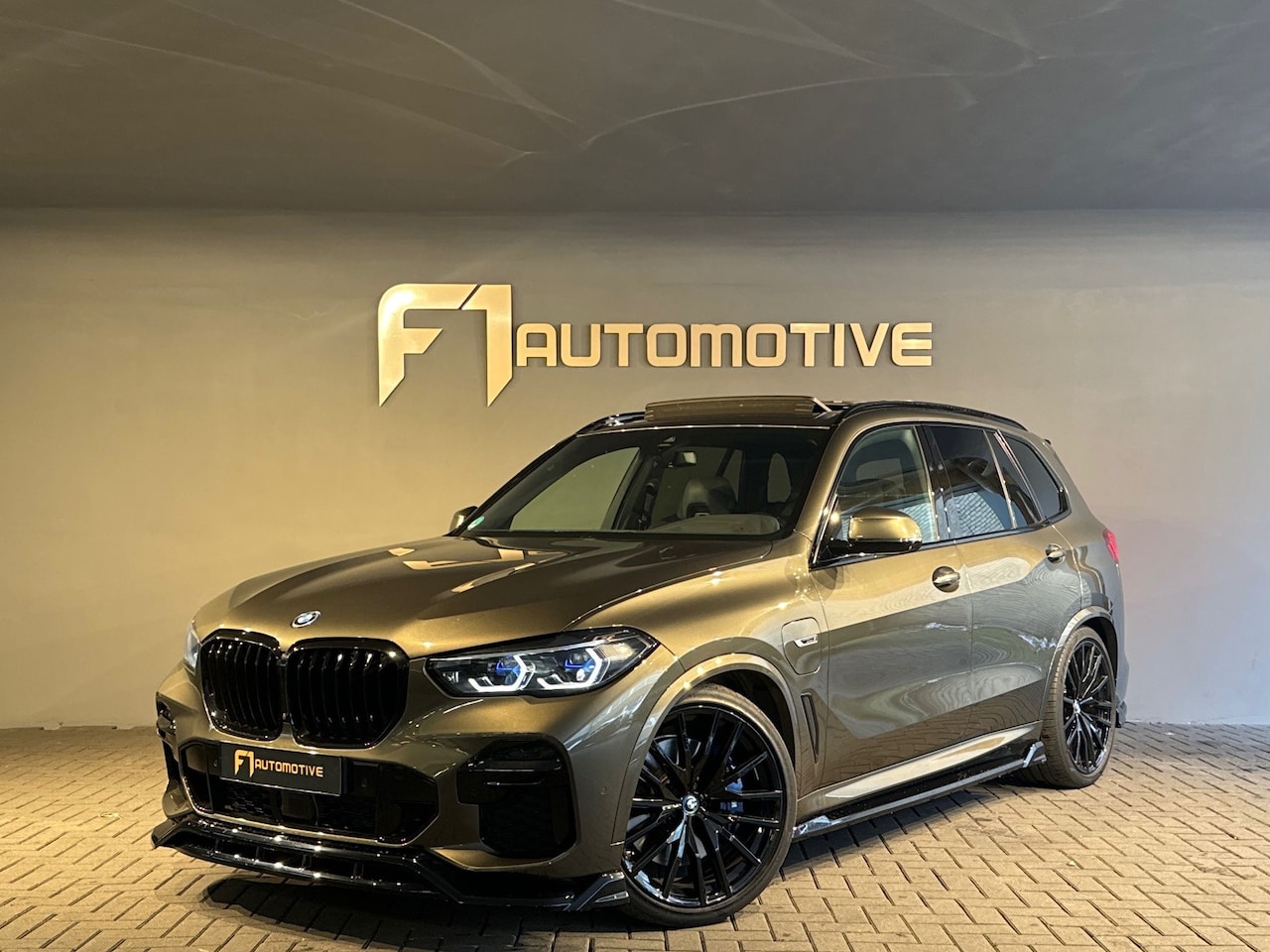 BMW X5 - XDrive45e High Executive M Sport Pano|M Seat|H/K|HuD - AutoWereld.nl