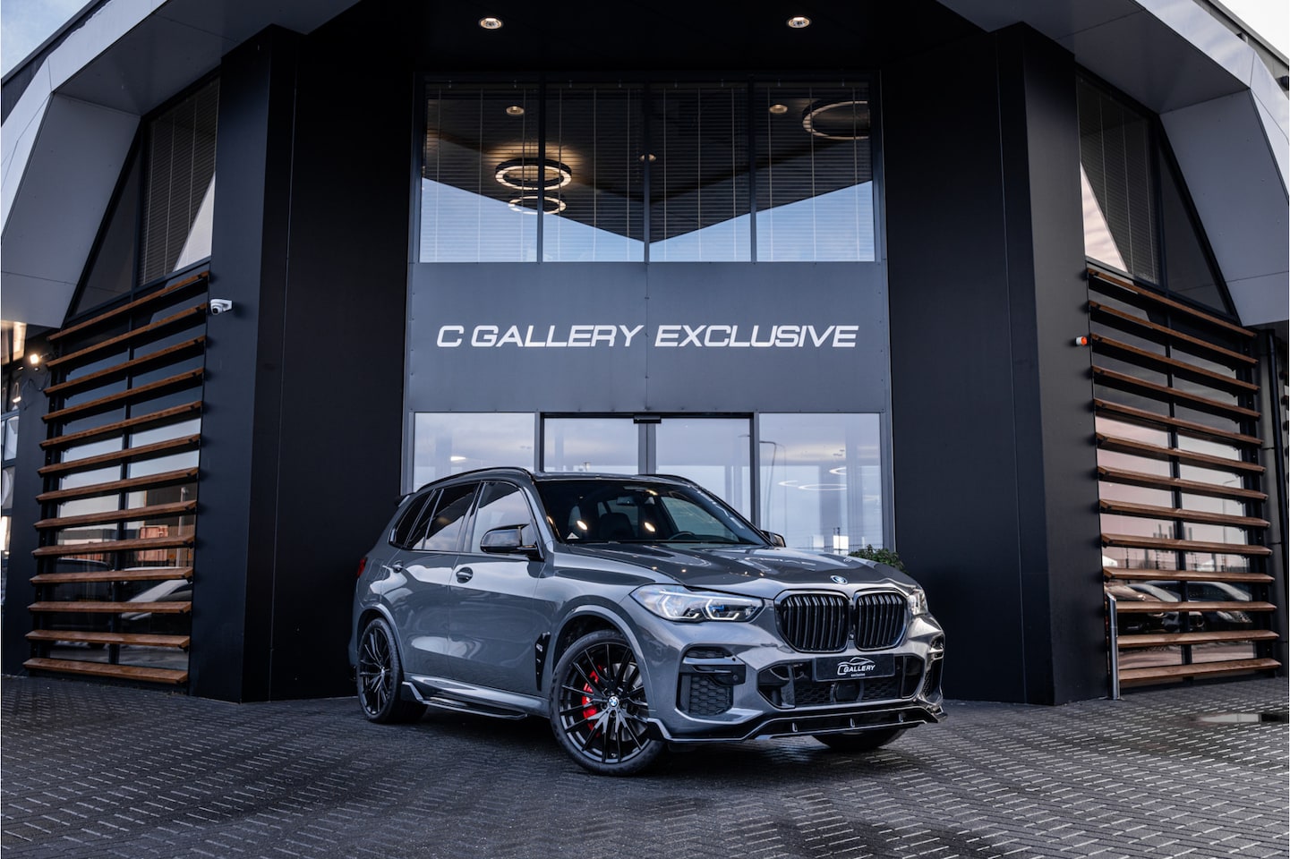 BMW X5 - xDrive45e High Executive - M Sport | Dravitgrau | Kuipstoelen | Panorama | Memory - AutoWereld.nl