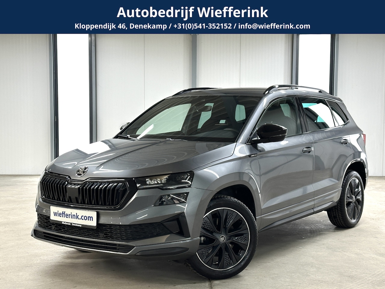 Skoda Karoq - 1.5 TSI ACT Sportline Business DSG | Elek. Trekhaak | Navigatiepakket | ACC | Ambient Ligh - AutoWereld.nl
