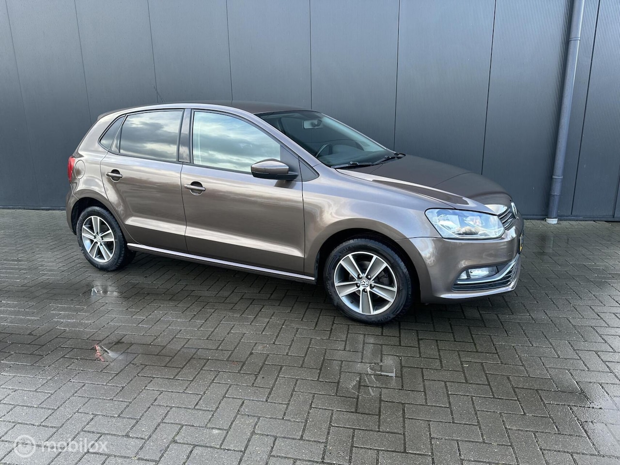 Volkswagen Polo - 1.2 TSI Comfortline Airco,Cruise,Navi - AutoWereld.nl