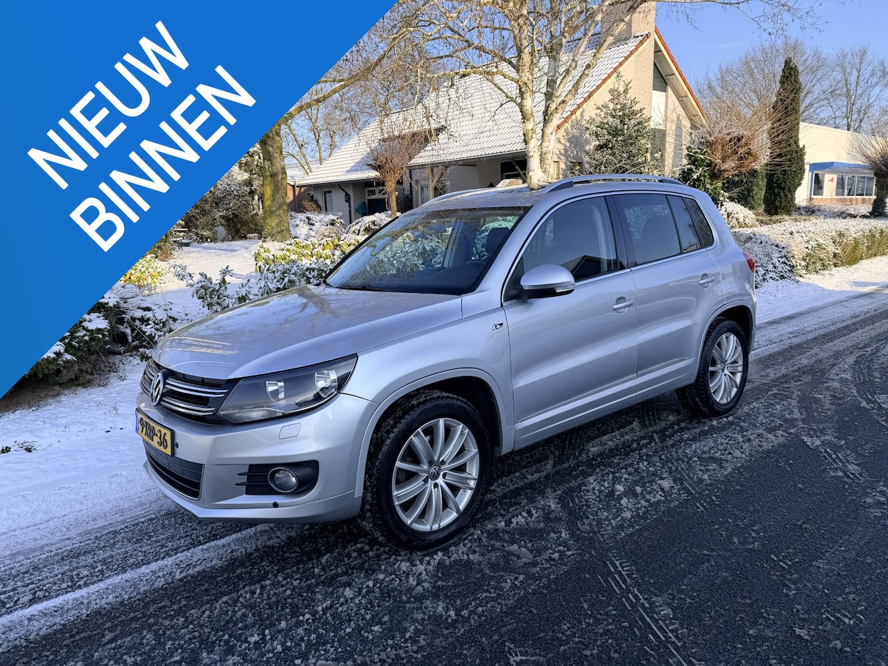 Volkswagen Tiguan - 2.0 TSI 4motion 211pk AUT R-line•Pano - AutoWereld.nl