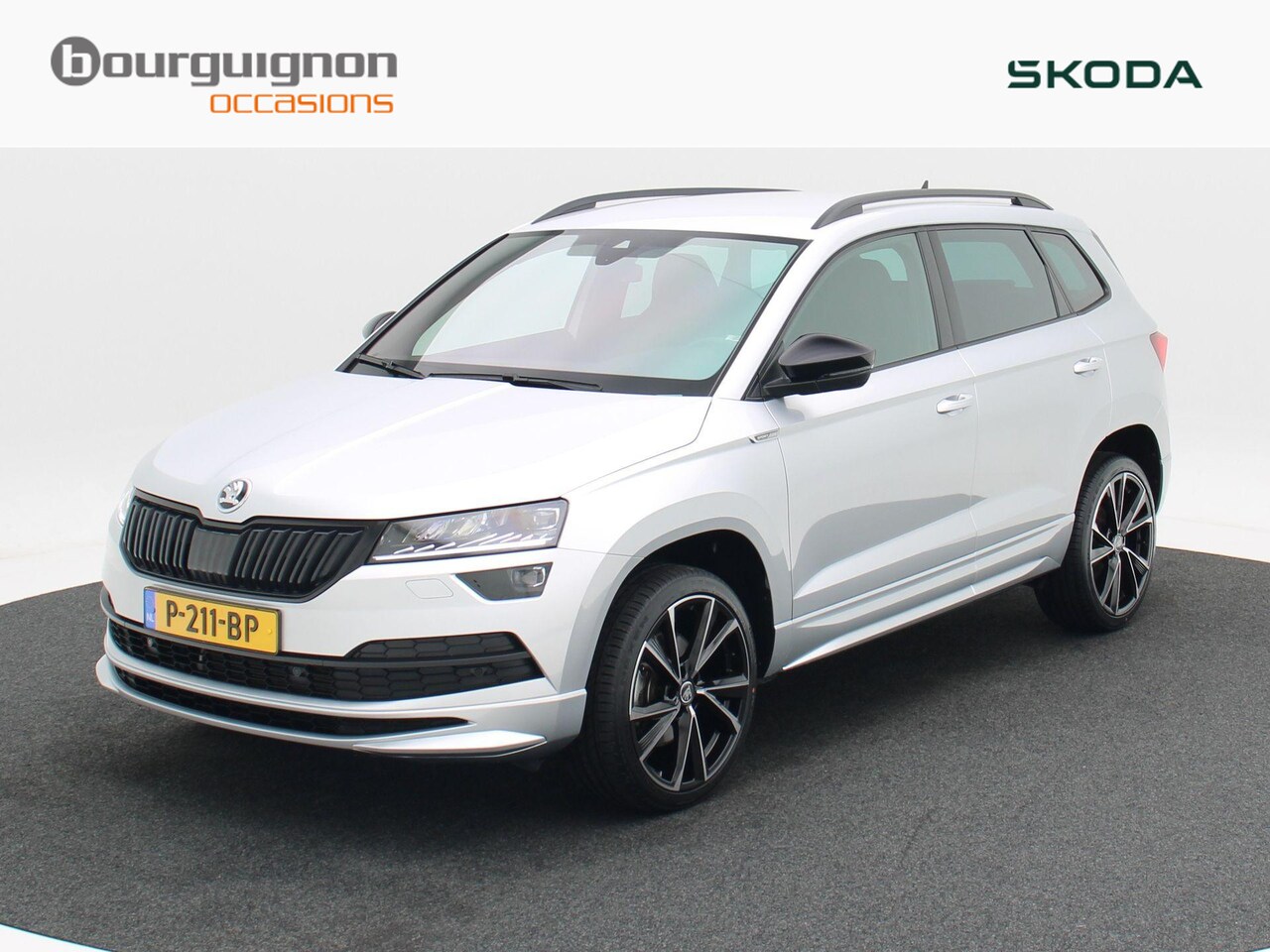 Skoda Karoq - 1.5 TSi 150 Pk Automaat Sportline Business | Trekhaak | Canton Audio | Camera | Adaptive C - AutoWereld.nl