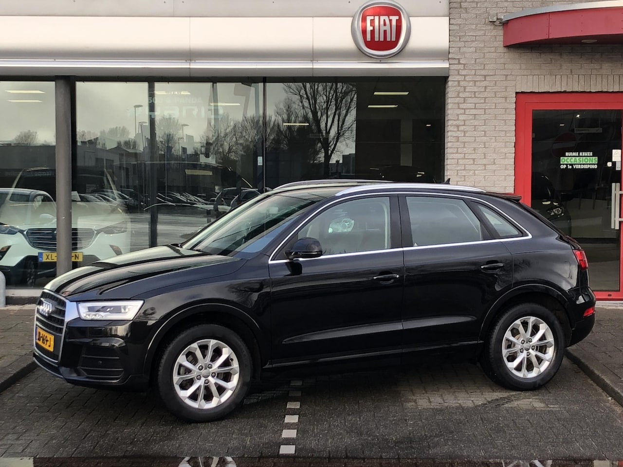 Audi Q3 - 2.0 TFSI quattro Design Pro Line Plus AUTOMAAT|4x4|CLIMATE|NAVI|LEER|PDC - AutoWereld.nl