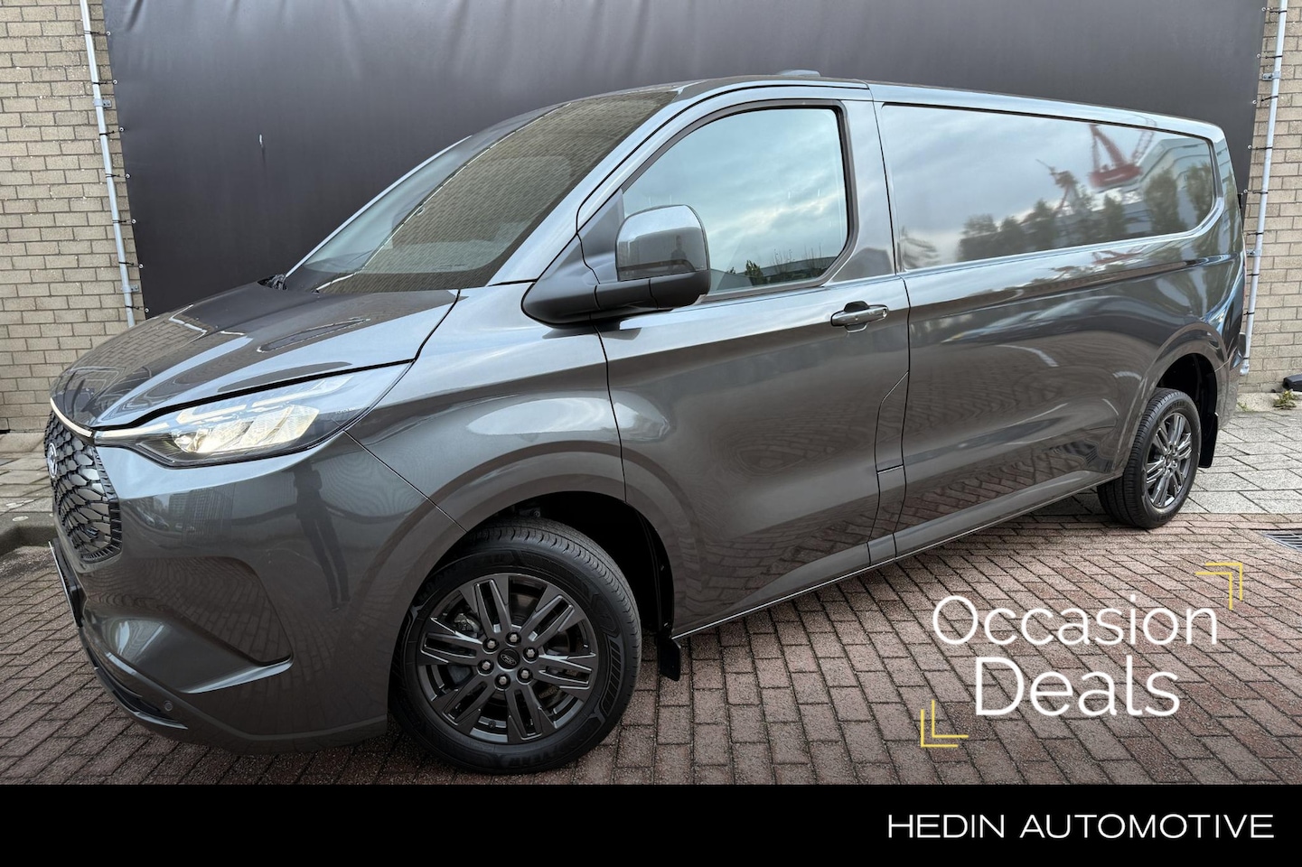 Ford Transit Custom - E-Transit 320 L2H1 Limited 65 kWh Driver assistant pack | Winter Pack | Trekhaak | - AutoWereld.nl