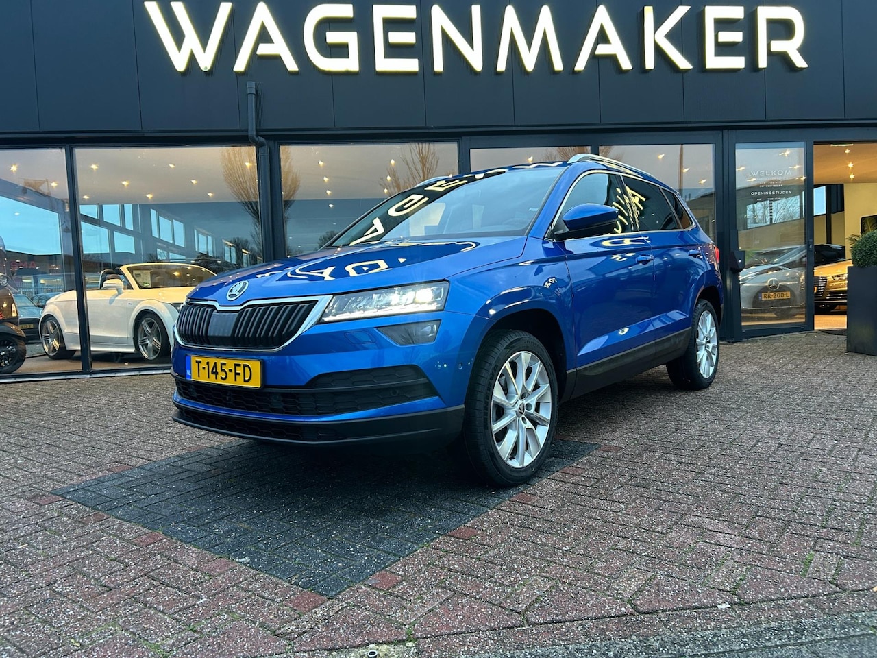 Skoda Karoq - 1.5 TSI ACT Sportline Business AUT|Clima|ACC|Navi - AutoWereld.nl