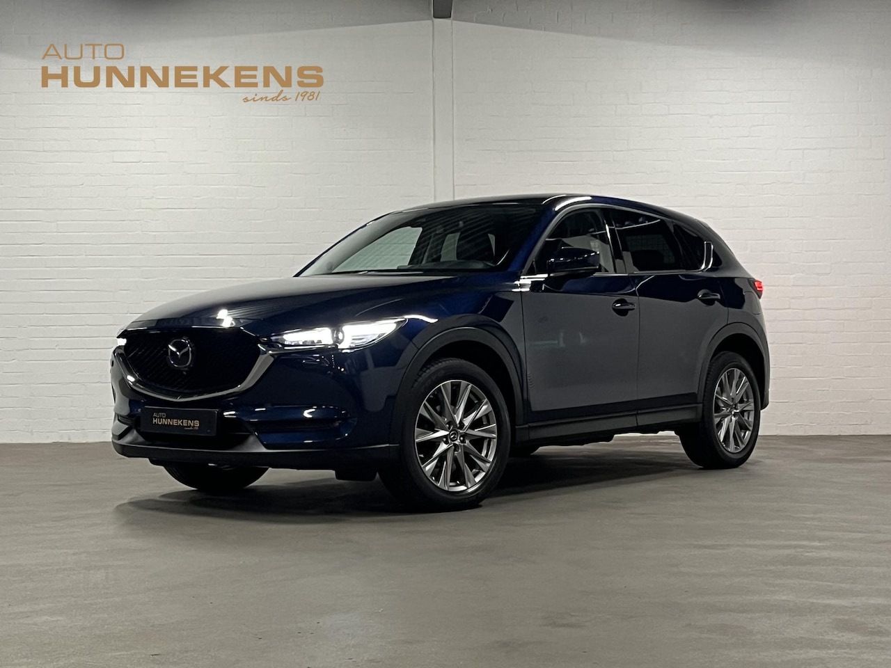Mazda CX-5 - 2.5 4WD SkyActiv-G 194 Luxury Open dak | Adapt. Cruise | Leder | 360 camera | Head-up | St - AutoWereld.nl