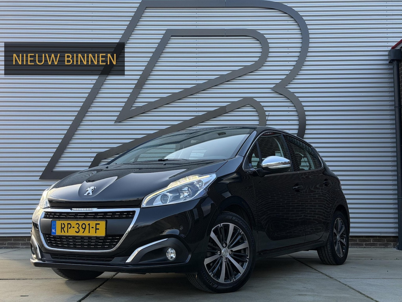 Peugeot 208 - 1.2 PureTech Allure 2e Eigenaar,Navi,Camera,Cruise,Clima,Apple Carplay,PDC,N.A.P,APK tot 1 - AutoWereld.nl