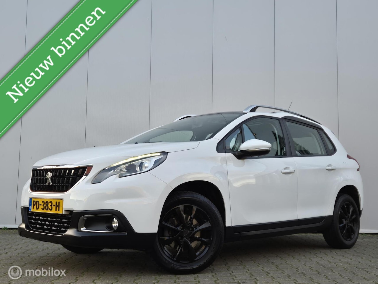 Peugeot 2008 - 1.2 PURETECH BLUE LION/PANO/TREKHAAK/LED/CARPLAY/PDC/CRUISE/16''LMV - AutoWereld.nl