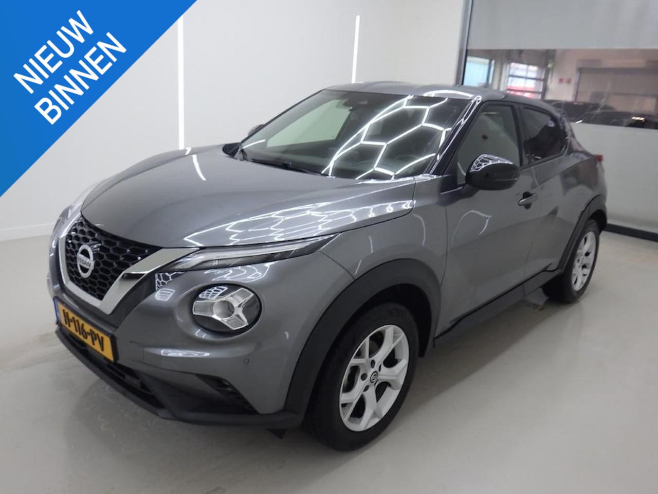 Nissan Juke - 1.0 DIG-T N-CONNECTA I TREKHAAK I P-CAMERA I APPLE CARPLAY I NAVIGATIE I CLIMATE CONTROL - AutoWereld.nl