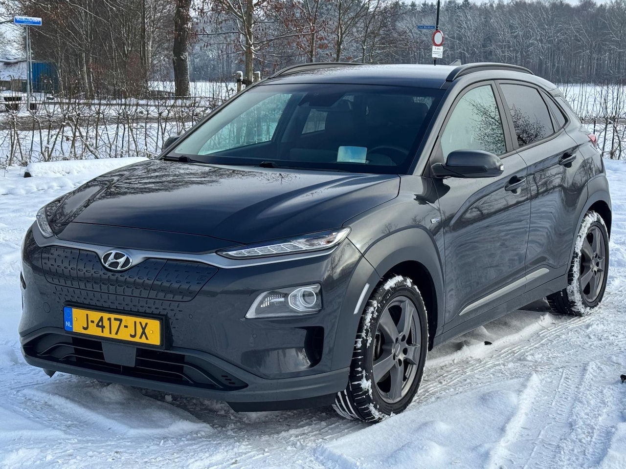 Hyundai Kona Electric - EV Premium 64 kWh SOH100% *LEDER/NAVI/CAMERA - AutoWereld.nl