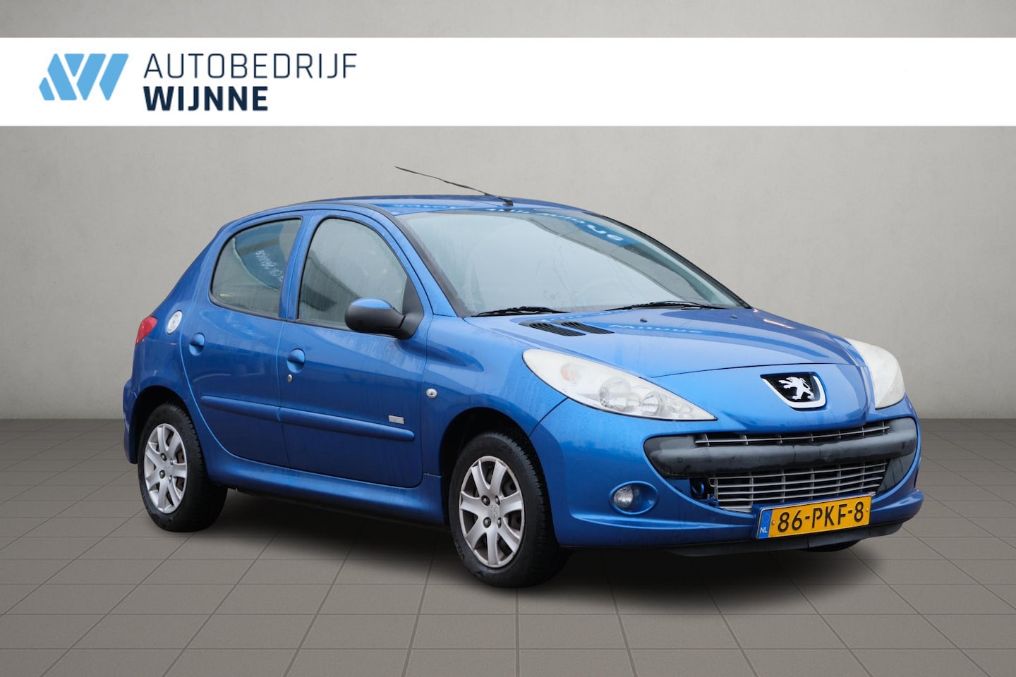 Peugeot 206 - 1.4 75pk 5-drs Millesim 200 | Airco | Radio-CD | Elektrische ramen - AutoWereld.nl