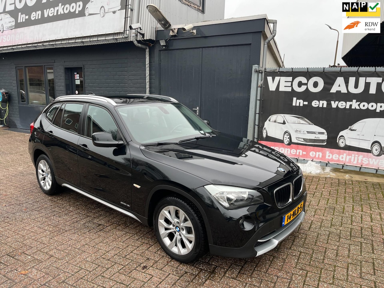 BMW X1 - SDrive18i Executive panorama navi nieuwstaat dealer onderhouden - AutoWereld.nl
