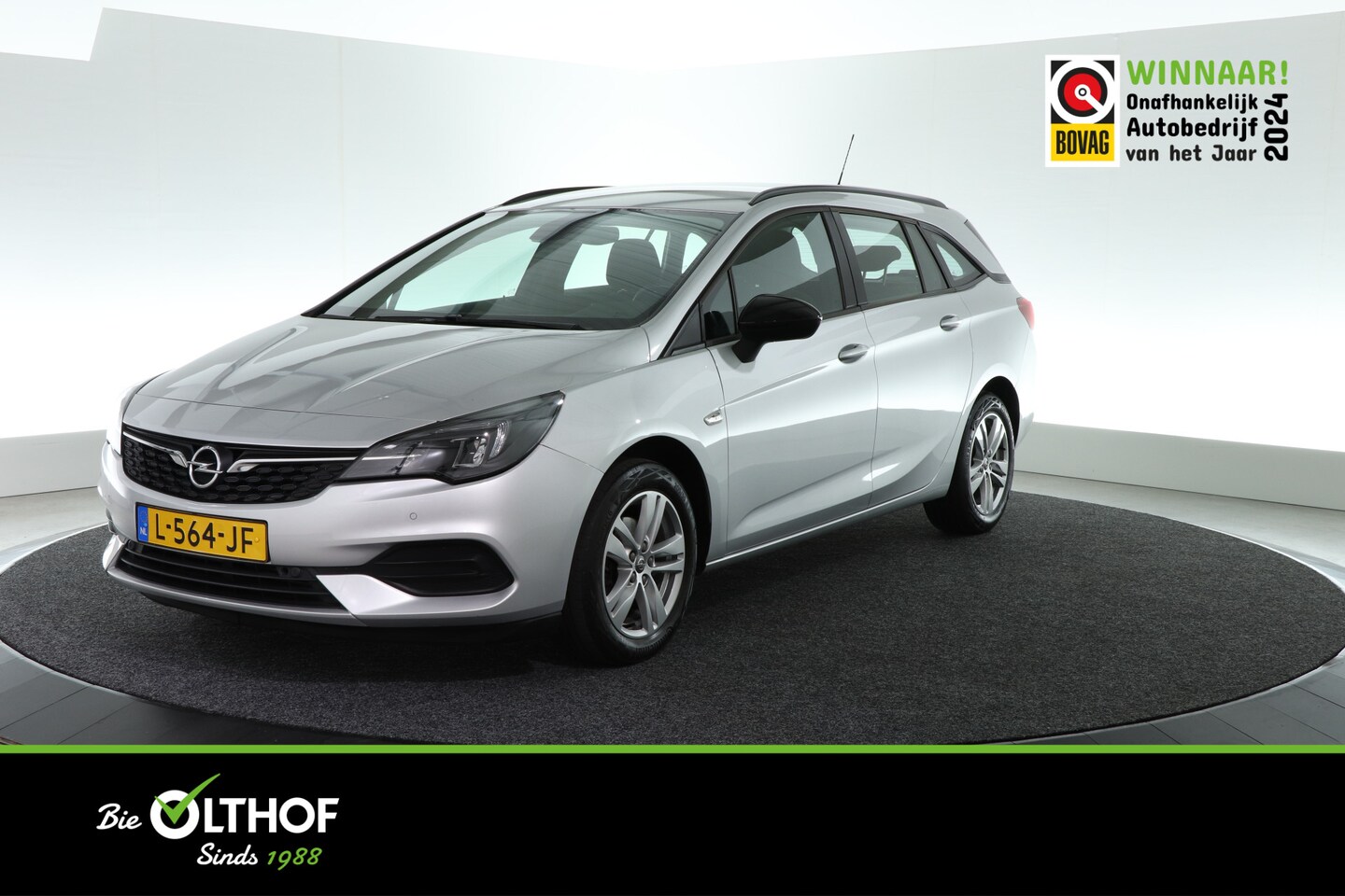 Opel Astra Sports Tourer - 1.2 Edition | TREKHAAK | NAVI | AIRCO | PDC | CARPLAY | - AutoWereld.nl