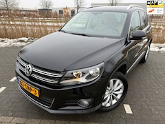 Volkswagen Tiguan - 1.4 TSI Sport&Style*CRUISE*AIRCO*LEER*NAVI*PARK SENSOREN*VELGEN*STOEL VERWARMING