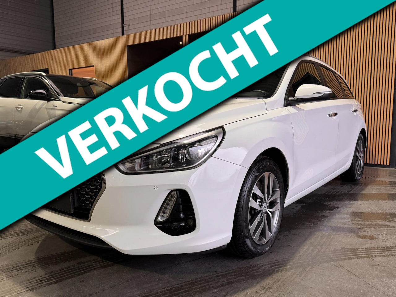 Hyundai i30 Wagon - 1.4 T-GDI Premium Camera|Keyless|Carplay|Airco|APK - AutoWereld.nl