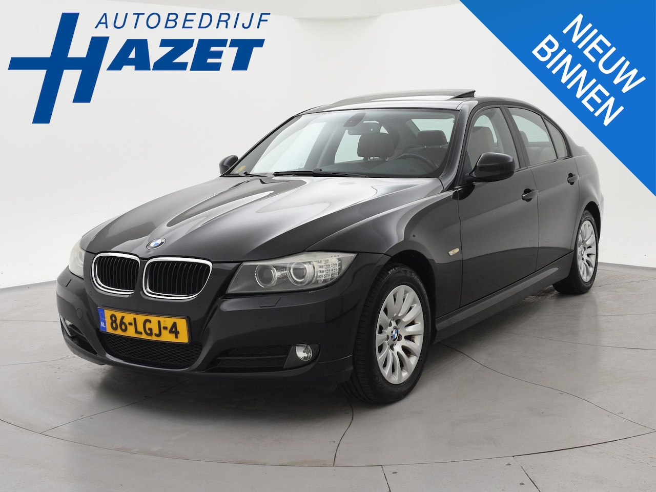 BMW 3-serie - 318D SEDAN AUT. + SCHUIFDAK | LEDER | XENON | NAVIGATIE | STOELVERWARMING - AutoWereld.nl