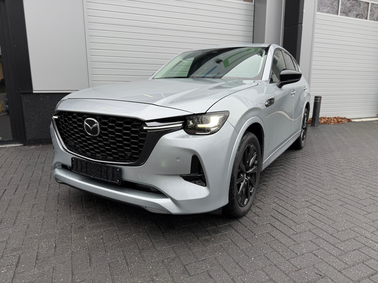 Mazda CX-60 - 2.5 e-SkyActiv PHEV Homura / Stoel koeling / Carplay / Head Up - AutoWereld.nl