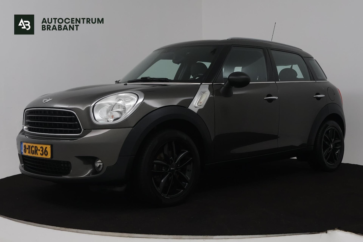 MINI Countryman - Mini 1.6 One Business Line (CRUISE CONTROL, BLUETOOTH, NAVIGATIE, PARKEERSENSOREN) - AutoWereld.nl