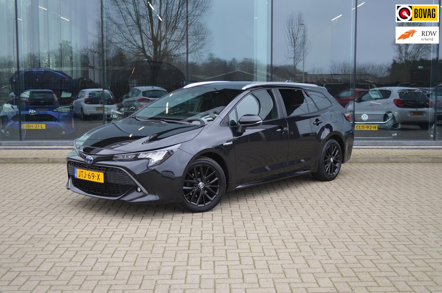 Toyota Corolla Touring Sports - 1.8 Hybrid Dynamic | Trekhaak | Keyless | Stoel & stuurverwarming - AutoWereld.nl