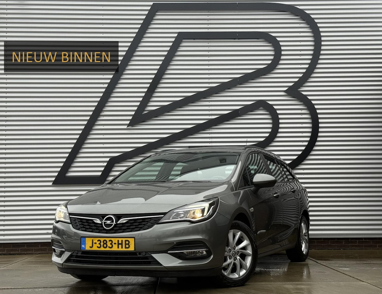 Opel Astra Sports Tourer - 1.2 Business Edition 2e Eigenaar,Apple Carplay,Airco,Camera,Cruise,PDC,Trekhaak,N.A.P,APK - AutoWereld.nl