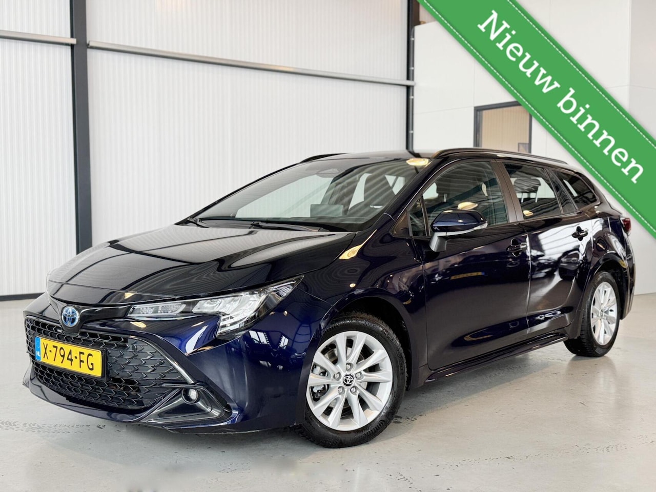 Toyota Corolla Touring Sports - Hybrid 140 Active - AutoWereld.nl