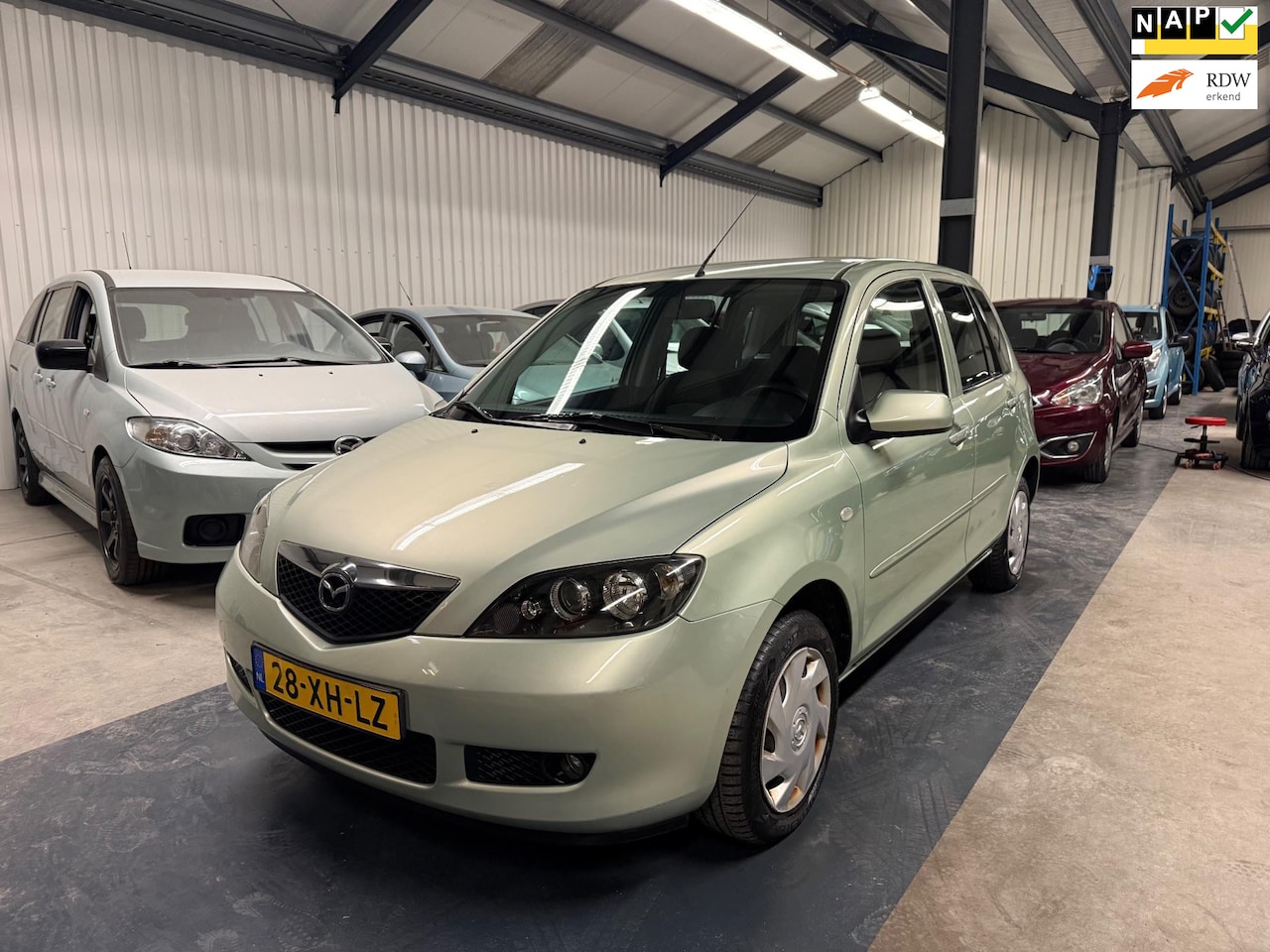 Mazda 2 - 1.4 Touring LAGE KM/AIRCO/NAP/APK - AutoWereld.nl