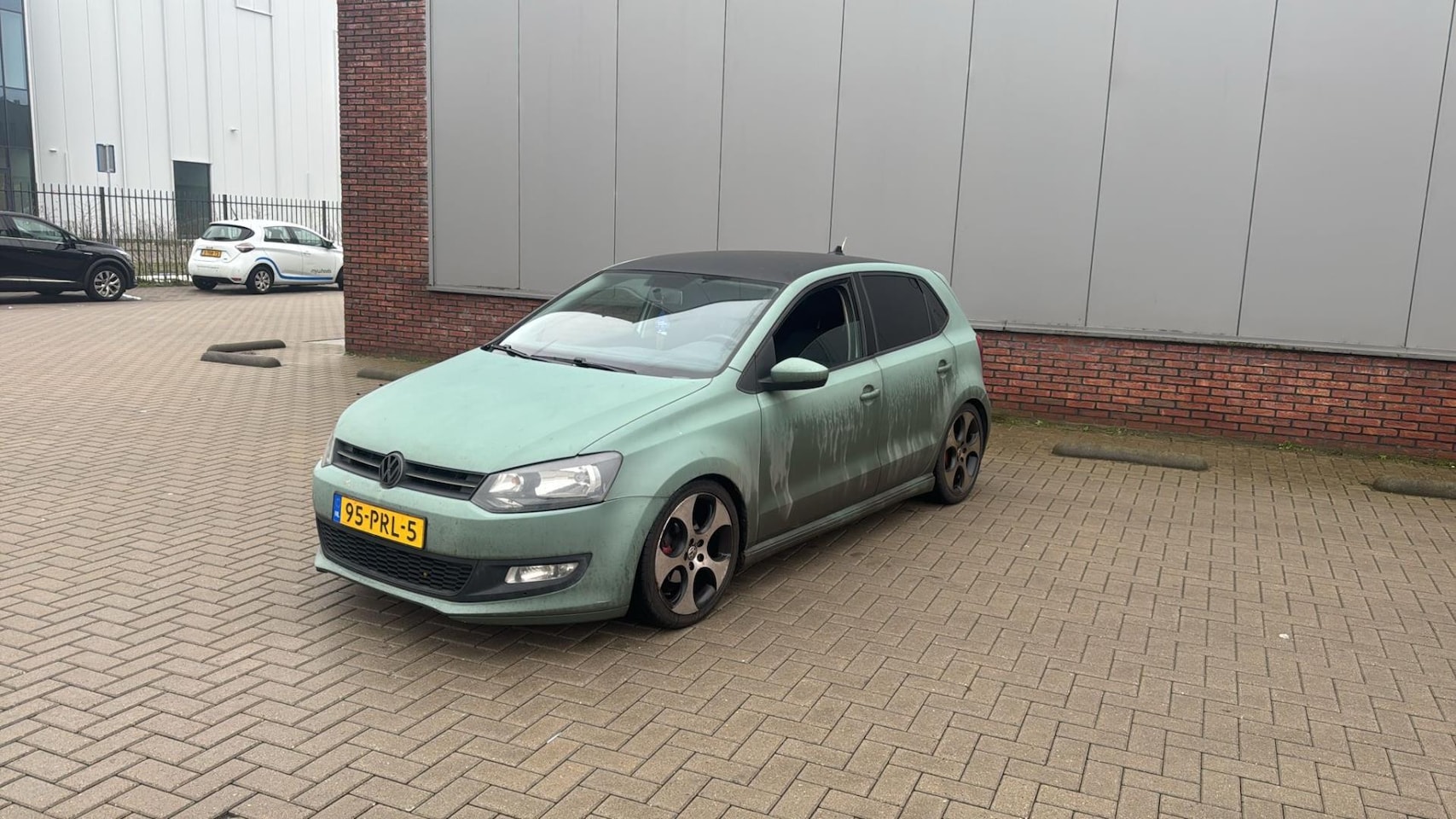 Volkswagen Polo - 1.2 TDI BlueMotion Comfortline GTI Look Grijs 2011 - AutoWereld.nl