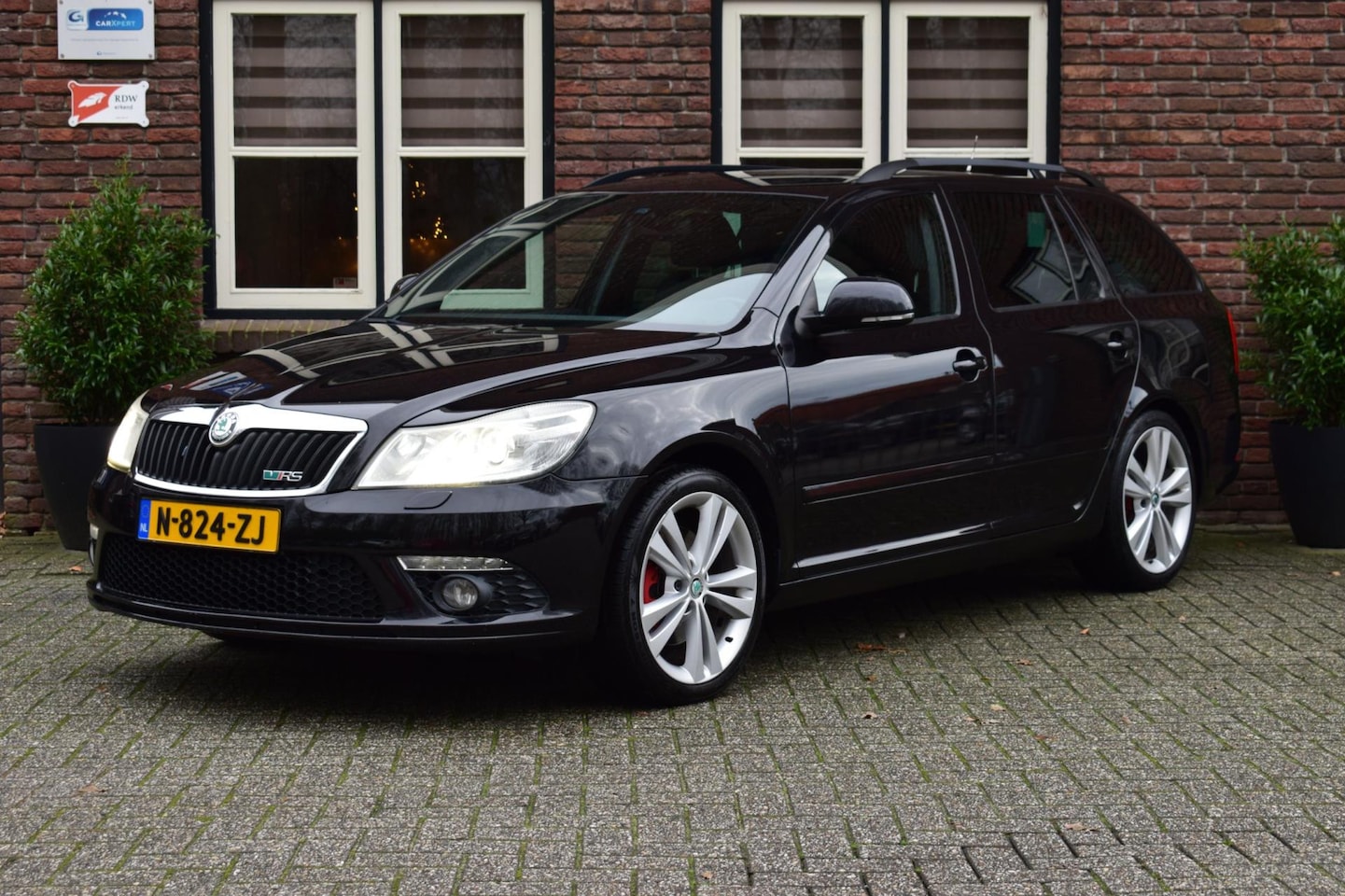 Skoda Octavia Combi - 2.0 TFSI RS 200PK Trekhaak | Stoelverwarming | Leer - AutoWereld.nl