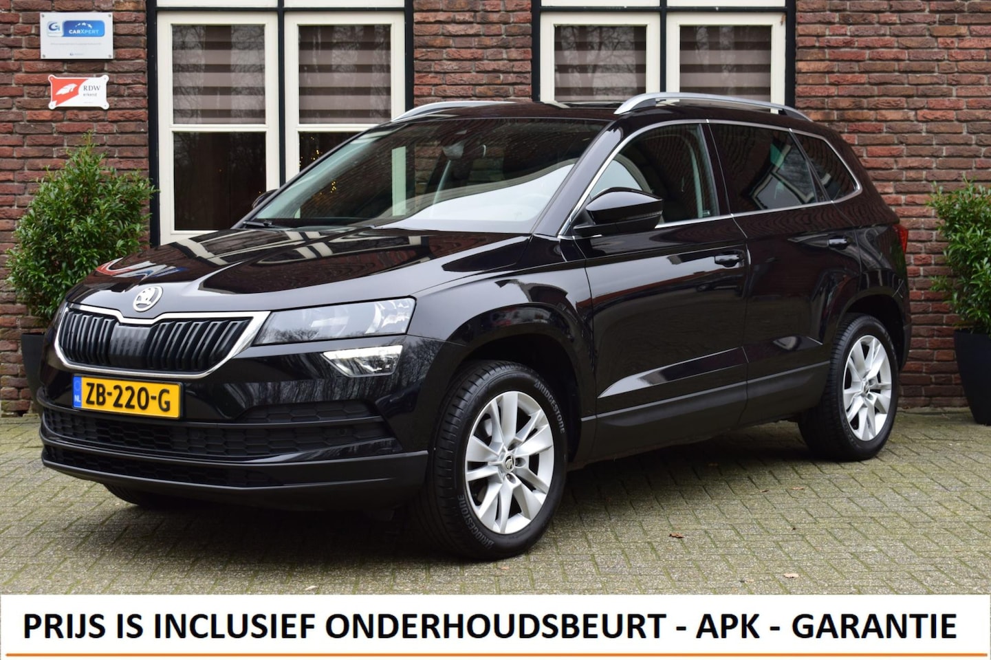 Skoda Karoq - 1.0 TSI DSG Aut. Ambition Trekhaak | Panoramadak | 2X PDC | APP connect - AutoWereld.nl