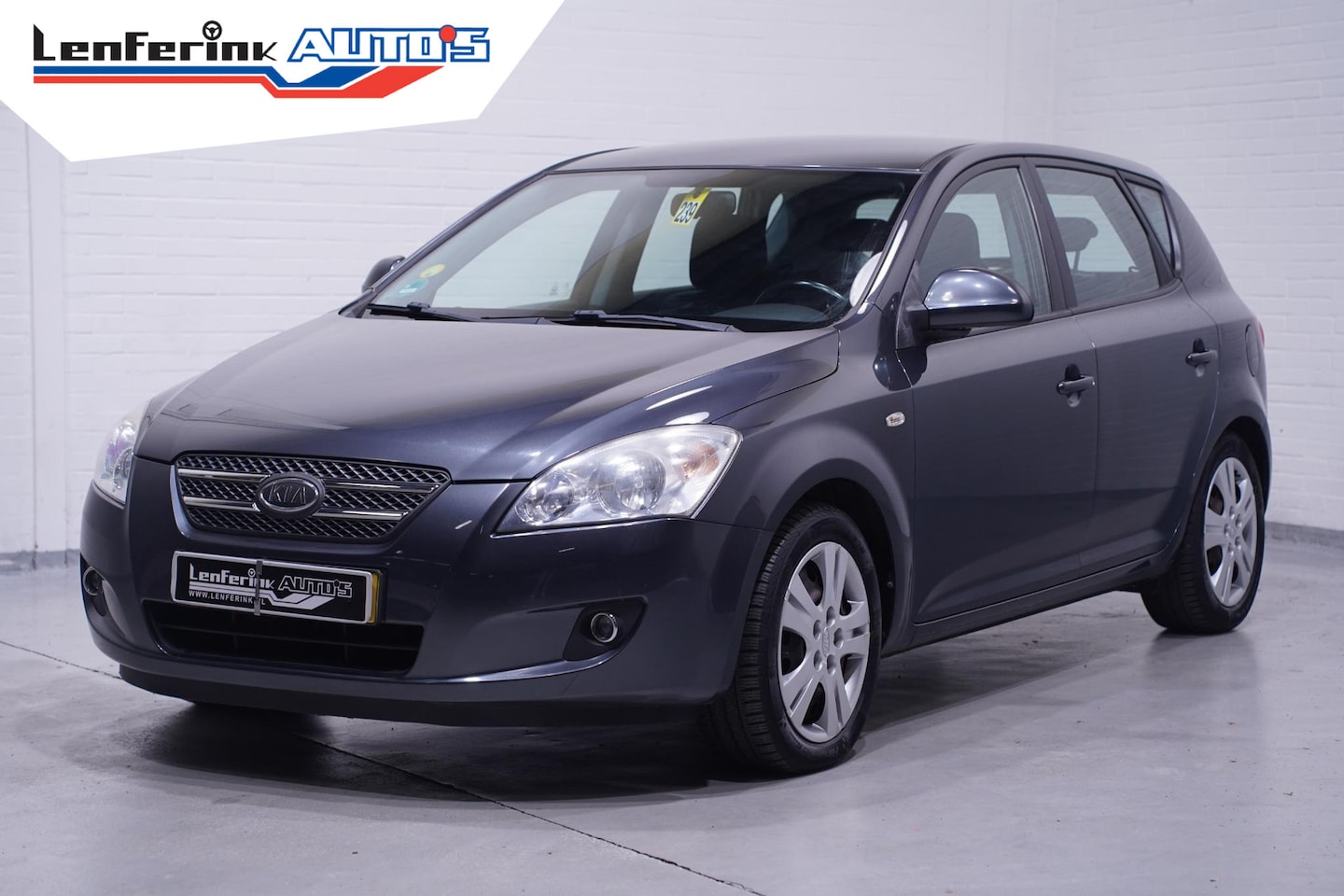 Kia Cee'd - 1.4 X-ecutive Clima Leder/stof - AutoWereld.nl